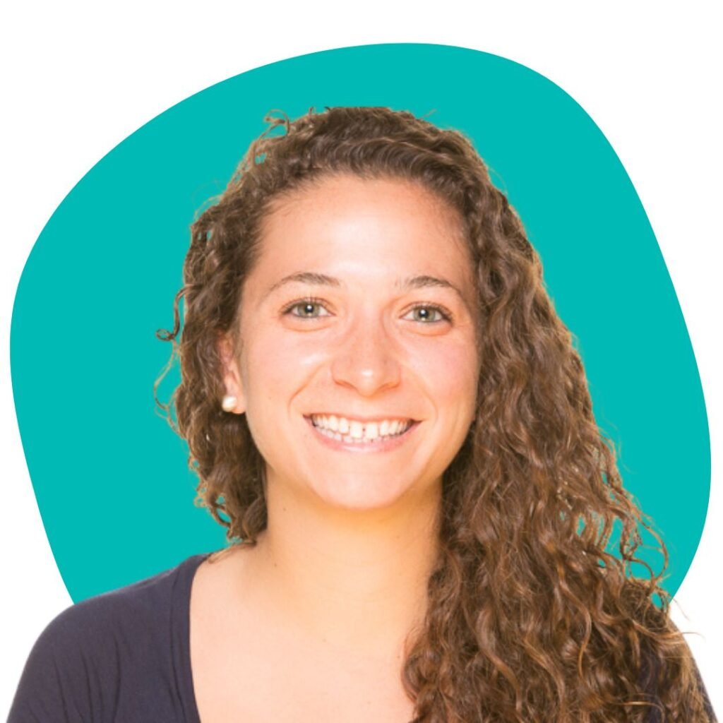 professional photo of a woman with long curly hair in front of a green circle.